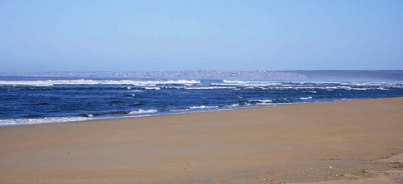 Long sandy beach with a view towards Jeffeys Bay